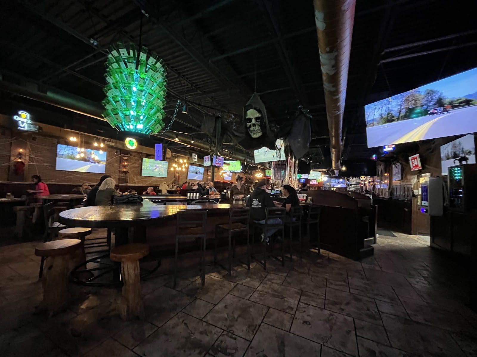 The room at Johnny J's with TVs on