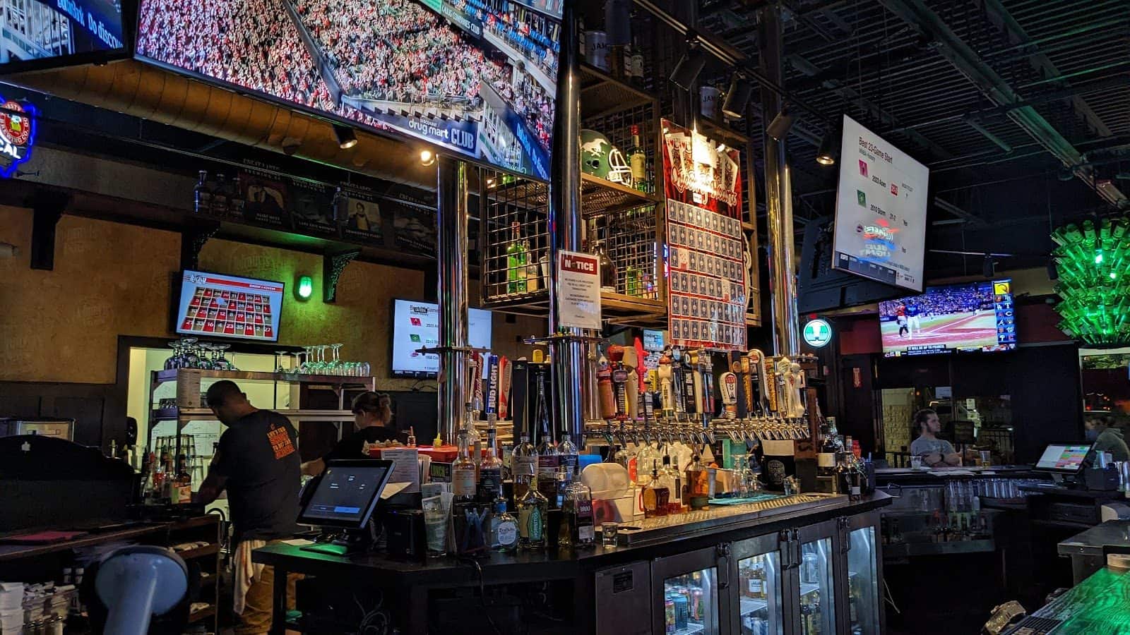 The bar and TV wall inside Johnny J's Pub & Grille, Strongsville